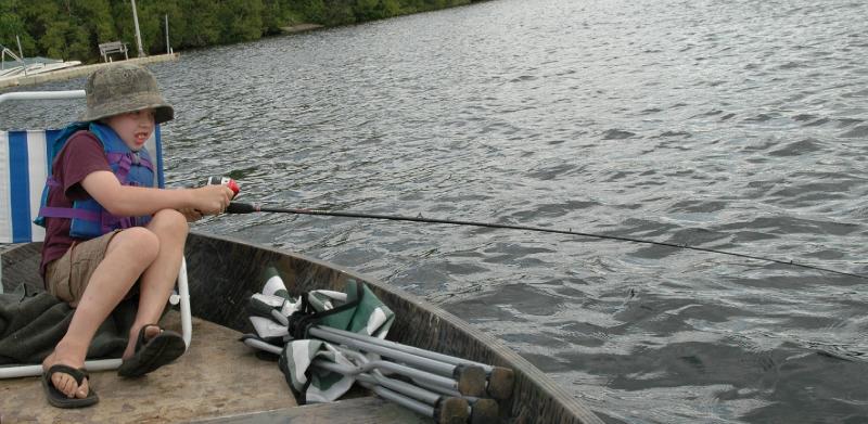 big one.jpg - Reeling him in.....